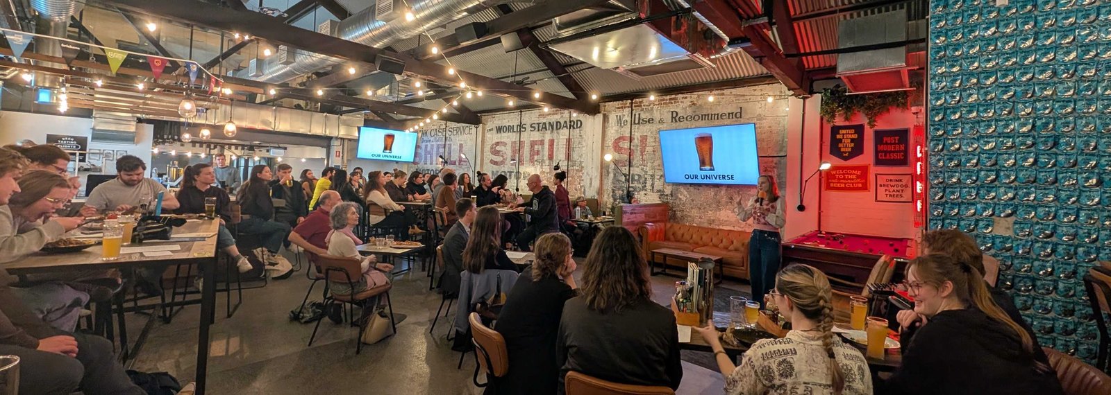 Panoramic view of a packed BrewDog during a Pint of Science evening